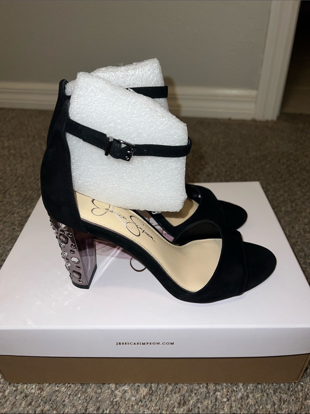 Jessica Simpson black heels. 6